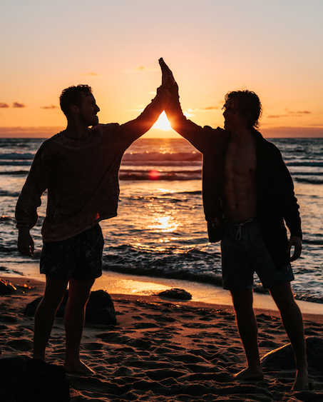 Image showing two men giving each other a high 5